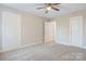 Spacious bedroom with ceiling fan and access to closets and bathroom at 1455 Southwest Blvd, Newton, NC 28658