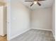 Spacious bedroom with gray carpet and ceiling fan at 1455 Southwest Blvd, Newton, NC 28658