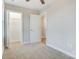 Bedroom with double door closet, window, and neutral wall color at 1455 Southwest Blvd, Newton, NC 28658