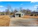 New single-story home with gray siding, landscaping, and driveway at 1455 Southwest Blvd, Newton, NC 28658