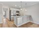 Modern kitchen with stainless steel appliances and granite counters at 1455 Southwest Blvd, Newton, NC 28658