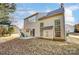 Home's exterior showcases a backyard with patio and lawn at 15011 Edindale Dr, Charlotte, NC 28277