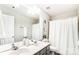 Bathroom boasts double vanity, large mirror and shower at 15011 Edindale Dr, Charlotte, NC 28277