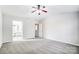 Spacious bedroom with gray carpet and access to bathroom at 15011 Edindale Dr, Charlotte, NC 28277