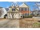 Two-story home with brick and siding exterior, two car garage at 15011 Edindale Dr, Charlotte, NC 28277