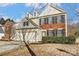 Two-story home with brick and siding exterior, two car garage at 15011 Edindale Dr, Charlotte, NC 28277