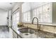 Kitchen sink and granite countertop with a window at 15011 Edindale Dr, Charlotte, NC 28277