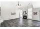 Spacious living room with fireplace and hardwood floors at 15011 Edindale Dr, Charlotte, NC 28277