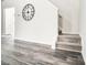 Gray carpeted stairs and wood-look flooring at 15011 Edindale Dr, Charlotte, NC 28277