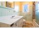 Bathroom with tiles and a window that brings in natural light at 1715 Emmanuel Church Rd, Conover, NC 28613