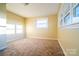 Bright bedroom with carpeted floor and natural light, ideal for restful nights at 1715 Emmanuel Church Rd, Conover, NC 28613