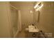 Clean bathroom with shower/tub combo and vanity at 1750 Oak Valley Dr, Gastonia, NC 28054