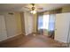 Bedroom with ceiling fan, neutral walls, and carpeting at 1750 Oak Valley Dr, Gastonia, NC 28054