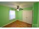 Bedroom with hardwood floors and ceiling fan at 1750 Oak Valley Dr, Gastonia, NC 28054