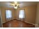 Bright bedroom with hardwood floors and ceiling fan at 1750 Oak Valley Dr, Gastonia, NC 28054