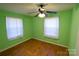 Bedroom with hardwood floors and ceiling fan at 1750 Oak Valley Dr, Gastonia, NC 28054