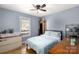 Relaxing bedroom with hardwood floors, natural light, and charming decor at 1825 Bloomsbury Dr, Rock Hill, SC 29730