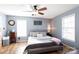 Comfortable main bedroom with hardwood floors and neutral decor at 1825 Bloomsbury Dr, Rock Hill, SC 29730