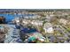 Stunning aerial view of waterfront condos featuring a swimming pool, fountain, and lake access at 18736 Nautical Dr # 201, Cornelius, NC 28031