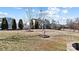 Spacious backyard with trees and a privacy fence at 2012 Orby Ave, Indian Trail, NC 28079