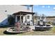 Relaxing backyard patio with pergola, fire pit, and built-in grill at 2012 Orby Ave, Indian Trail, NC 28079