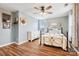 Charming bedroom with a metal bed frame and decorative wall art at 2012 Orby Ave, Indian Trail, NC 28079