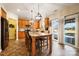 Kitchen with granite island, stainless steel appliances and backyard access at 2012 Orby Ave, Indian Trail, NC 28079