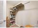 Well-organized laundry room featuring shelving and hanging rod at 2012 Orby Ave, Indian Trail, NC 28079