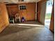 Unfinished basement with concrete floor and some shelving at 240 Pointe Cir # 240, Rock Hill, SC 29732