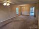 Spacious living room with carpet flooring and a ceiling fan at 240 Pointe Cir # 240, Rock Hill, SC 29732