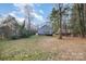 Large backyard with wooded area at 275 Broad Sw Dr, Concord, NC 28025