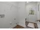 Laundry room with exterior access and shelving at 275 Broad Sw Dr, Concord, NC 28025