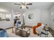 Living room with open concept to kitchen and view of back door at 275 Broad Sw Dr, Concord, NC 28025