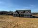 Modern farmhouse exterior with landscaping at 2906 Lathan Rd, Monroe, NC 28112