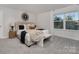 Well-lit bedroom with a queen bed and stylish decor at 3016 Ora Smith Rd, Lincolnton, NC 28092