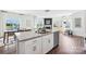 Kitchen with granite countertops, white cabinets, and a large island at 3028 Ora Smith Rd, Lincolnton, NC 28092