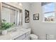 Well-lit bathroom with granite countertops and decorative art pieces at 3312 Meadow Wood Ct, Maiden, NC 28650