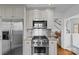 Modern kitchen featuring stainless steel appliances and granite countertops at 373 Hillside Ave, Charlotte, NC 28209