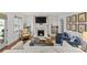 Cozy living room featuring a fireplace with built-in shelving at 373 Hillside Ave, Charlotte, NC 28209