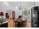 Elegant dining room features hardwood floors, a large window, and a charming antique table at 3917 Acacia N Rd, York, SC 29745