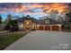 Brick house with three-car garage, and landscaping at 3917 Acacia N Rd, York, SC 29745