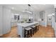 Modern kitchen with large island, stainless steel appliances, and light grey cabinets at 3917 Acacia N Rd, York, SC 29745