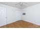 Bright bedroom features a ceiling fan, and neutral walls and flooring at 3988 Crestview Dr, Rock Hill, SC 29732