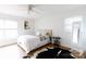 Bedroom with a queen bed, cowhide rug, and ceiling fan at 3988 Crestview Dr, Rock Hill, SC 29732