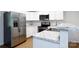 Modern kitchen featuring stainless steel appliances, granite countertops, and white cabinetry at 3988 Crestview Dr, Rock Hill, SC 29732