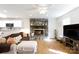 Living room with stone fireplace and open concept kitchen at 3988 Crestview Dr, Rock Hill, SC 29732