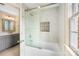 Updated bathroom with a shower/tub combo and marble tile at 4120 St Timms Ct, Charlotte, NC 28226