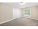 Spacious bedroom with double door closet and neutral decor at 4120 St Timms Ct, Charlotte, NC 28226