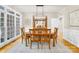 Bright dining room with hardwood floors and large windows at 4120 St Timms Ct, Charlotte, NC 28226