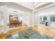 Spacious foyer with marble floors, columns, and views to living and dining areas at 4120 St Timms Ct, Charlotte, NC 28226